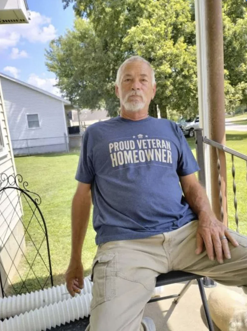 picture of Fred E. in front of a house